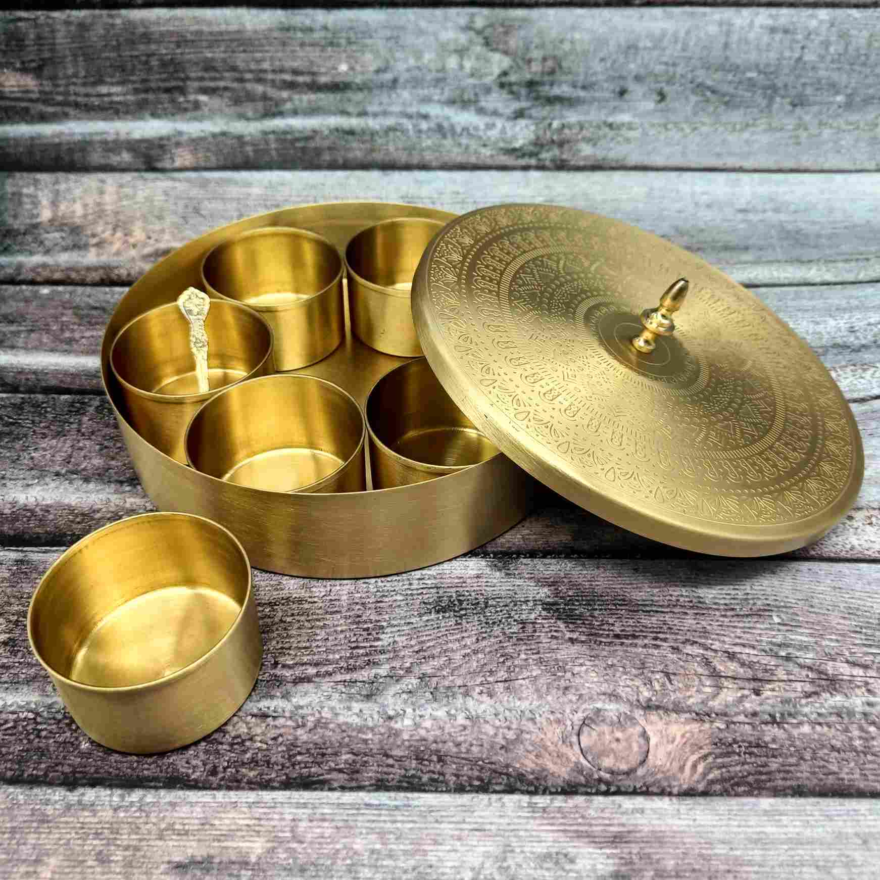 Brass embossed masala retailer spice box diameter 7 inch.